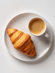 Croissant with Coffee on White Plate in Bright Minimalist Setting