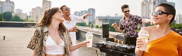 Friends celebrate friendship on a vibrant rooftop party with music and drinks