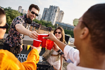 Friends enjoy a vibrant rooftop party filled with laughter and good vibes