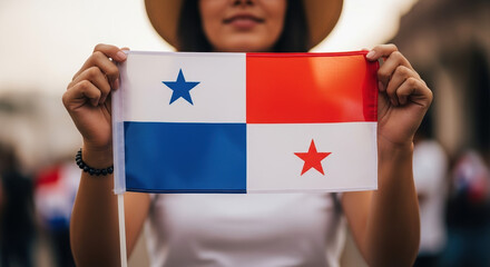 Panama Independence Day celebrated with flag held by unrecognizable woman, celebrating anniversary. This vibrant Panama Independence Day commemorates nation's freedom,