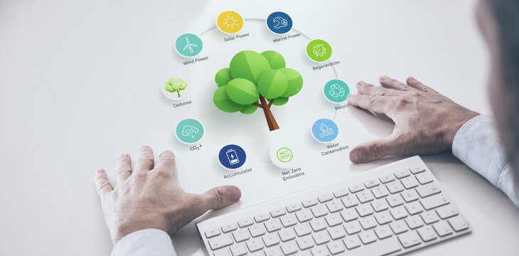 Professional managing green energy strategy and net zero goals on a virtual dashboard