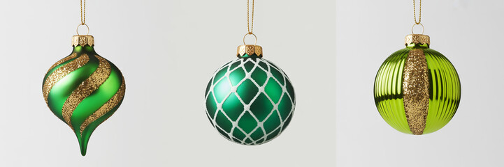 Three elegant green glass christmas ornaments with gold accents hanging