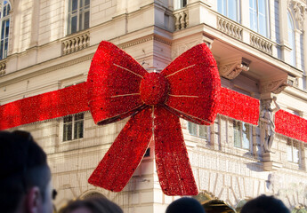 Giant Festive Red Bow Decoration on Building
