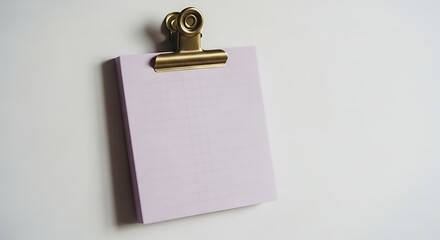 Blank clipboard with gold clip on white background