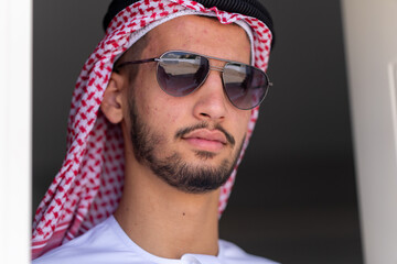 Arab Man Greeting Visitors at Entrance. High quality photo