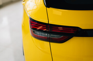 Taillight of a yellow car