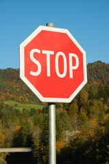 Red Octagonal STOP Sign on a Street Post