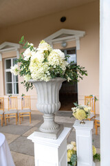 Wedding Floral Urns on Ceremony Columns in Latvia