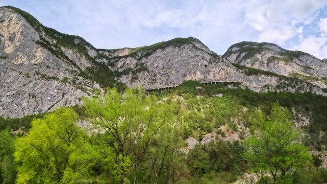 Alpine terrain as it winds from Innsbruck, Austria, through the Tyrol Alps, into Germany via the Brenner Pass corridor shot from on board EuroCity, &Ouml;BB Railjet, or regional Mittenwaldbahn trains.