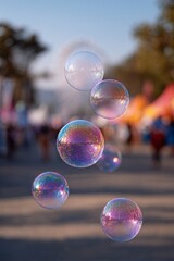 Floating bubbles on a sunny street, creating playful reflections.