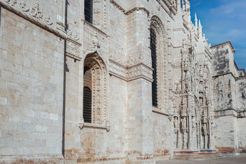 Fototapeta premium Architectural details of the Jeronimos Monastery, built in the early 16th century and continued for a hundred years, in Manueline architecture, by King Manuel I. Lisbon, Portugal, 2023