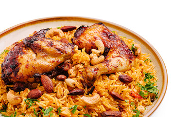 Delicious rice dish with roasted chicken and mixed nuts for a festive meal