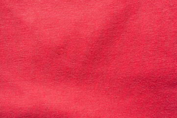 Close-up of vibrant red fabric texture, perfect for backgrounds and designs