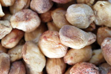Natural dried apricots background top view macro