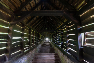 Long wooden tunnel  leading upstairs, Sighisoara, Romania