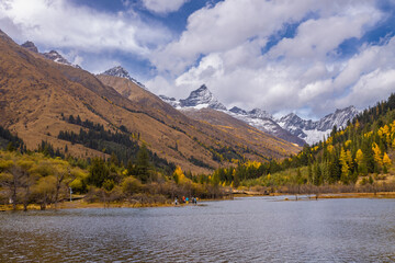 Siguniang Mountains (Four Girls Mountain) is a famous tourist attraction in Sichuan, China, It features mountains, pine forest streams and wild animals and has been certified as a 5A level 