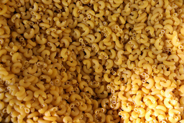 Elbow macaroni pasta close up dry pasta texture