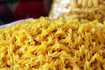 Pile of Egg Noodle Pasta Background Close Up Texture