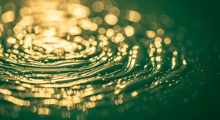 Abstract gold light reflection on water surface with green tone