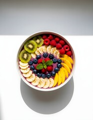 Colorful Smoothie Bowl with Fresh Fruits on White Table