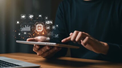 Person interacting with a tablet displaying AI chip and various digital icons, representing technology and data - Powered by Adobe