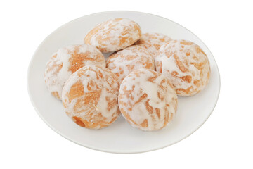 Romantic biscuit. Round gingerbread cookies in plate on a white background. Spicy sweets for holiday. Top view.