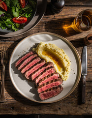 grilled steak and mashed potatoes flatlay