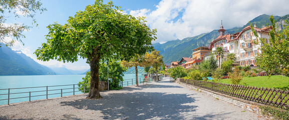 stunning lakeside promenade Brienzersee, pictorial houses and gardens, destination Bernese Oberland