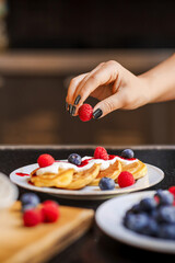 Delicious Golden Pancakes with Fresh Berries and Cream, Perfect Breakfast