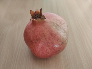 pomegranate on a wooden table