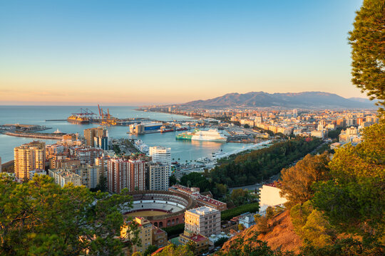 Plaza del toros and port of Malaga at sunrise. Spain