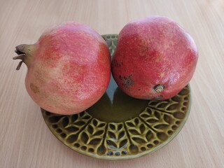 pomegranate on a wooden table