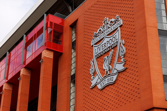 Liverpool, England - 10.08.2025: Liverpool FC crest on red brick wall at Anfield stadium