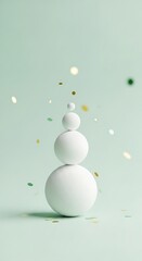 Minimalist arrangement of white spheres with confetti on a light green background