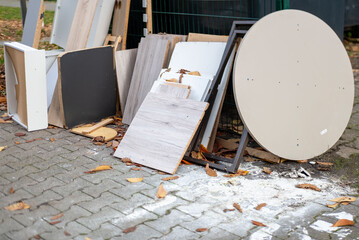 bulky waste reduction, large pile discarded furniture and wooden panels, renovation or decluttering process, used things on street, municipal waste management, diverted for recycling, pollution nature