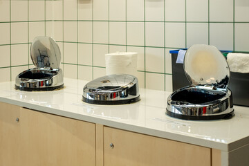 automated bins for efficient food waste sorting, chrome trash can or container in self service...
