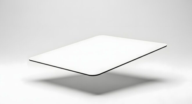 Floating Rectangular Tablet: A sleek, rectangular tablet levitates gracefully, offering a minimalist presentation against a soft backdrop. Emphasizing modern design and a sense of innovation.