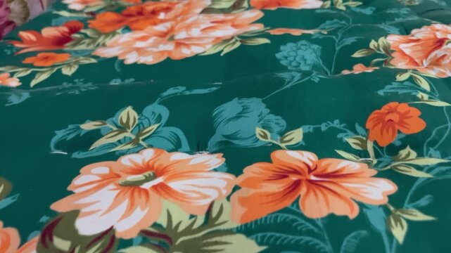 Documentary-style footage of the classic Kapok-filled mattress, widely used in Southeast Asian and Indonesian homes for decades.