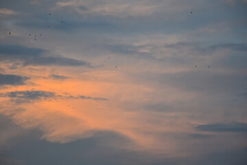 Stunning late afternoon sky enriched by glowing sunset colors and warmth