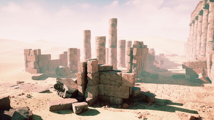 Fototapeta premium Crumbled columns and stone remnants lie scattered in a vast desert, bathed in warm light under a clear blue sky. The serene atmosphere evokes a sense of history and mystery.