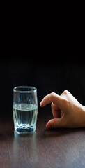 An optimist and a pessimist's opinion about a glass of water