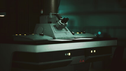 Advanced apparatus sits in a dimly lit laboratory, showcasing intricate details and glowing buttons. The atmosphere hints at cutting edge research and innovation in science.