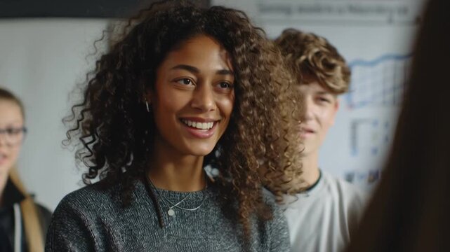 Academic presentation moment, confident student explaining chart to peers, teacher smiling proudly, cinematic focus on faces and gestures, atmosphere of intelligence and expression, realism of academi