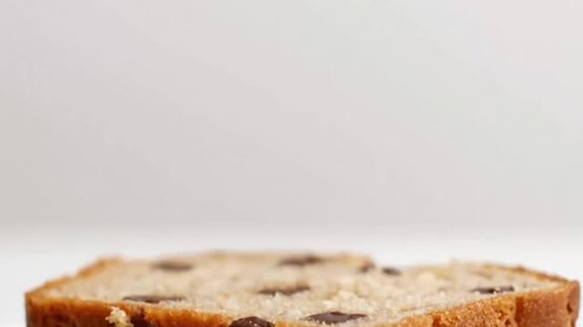 Close-up of freshly baked chocolate chip banana bread slices showcasing