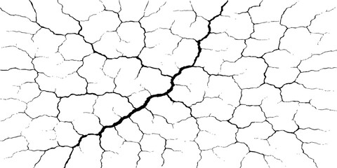 Dry cracked earth texture of the desert ground and old wall