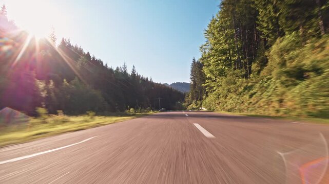 POV driving plate view on a mountain road on a sunny day