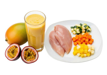 Isolated presentation of a mango smoothie, fresh fruit and raw chicken breast for a healthy meal