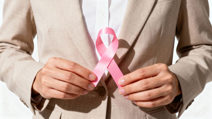 Support for cancer awareness through a pink ribbon at a community event promoting health