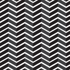 Geometric Chevron Pattern: A captivating geometric pattern of gray, white, and black chevron zigzags, exuding a sense of contemporary design.