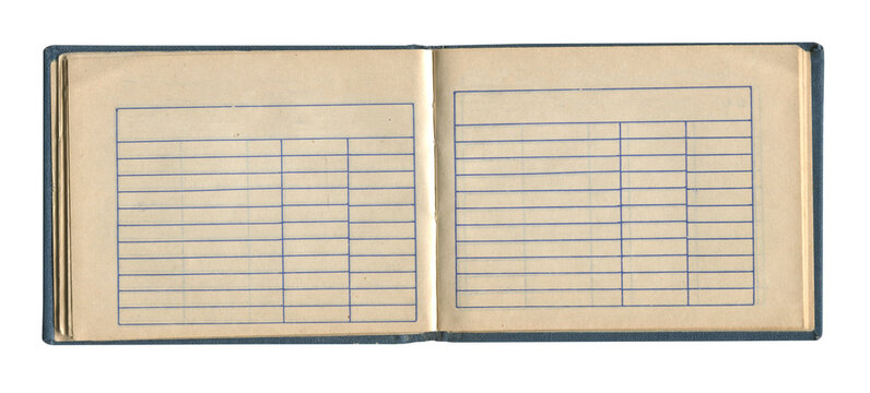 small old notebook with vintage yellow brown paper cloth cover and empty spreadsheet accounting charts inside open and isolated on white